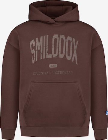 Veste de survêtement Smilodox en marron : devant