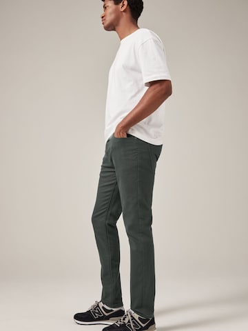 Next Skinny Jeans 'Essential' in Grau