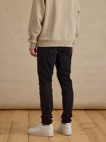 DAN FOX APPAREL Слим Джинсы 'Lian' в Черный