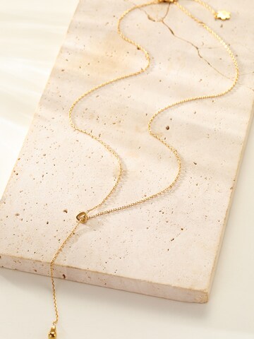 Hey Happiness Halsband 'Heart Lariat' i guld