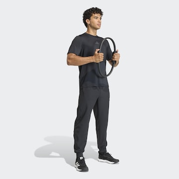 ADIDAS PERFORMANCE Tapered Workout Pants in Black