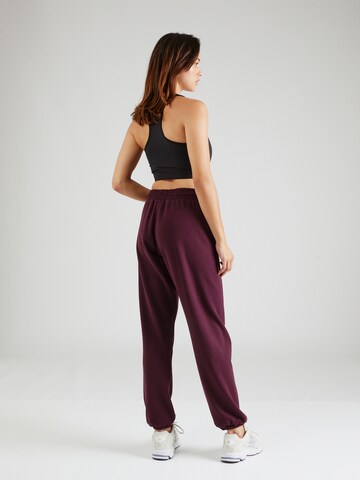 Effilé Pantalon de sport DKNY Performance en violet