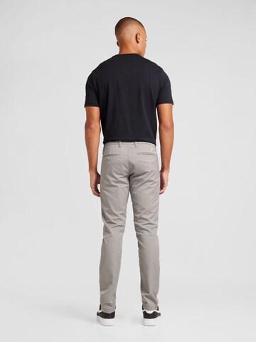 Carhartt WIP Slimfit Chino hlače 'Rebel' | siva barva