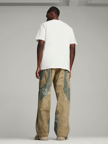 PUMA - regular Pantalón deportivo 'Puma X Kidsuper Track Pants' en beige