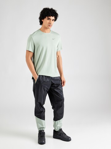 Maglia funzionale 'MILER' di NIKE in verde