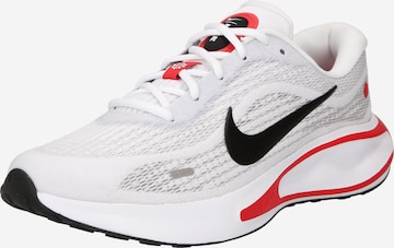 Chaussure de course NIKE en blanc : devant