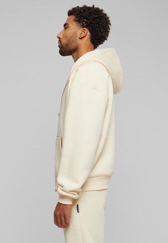 Prohibited Zip-Up Hoodie in Beige