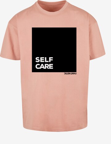 T-Shirt 'Self Care' F4NT4STIC en rose : devant