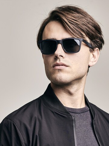 SINNER Sunglasses in Black: front