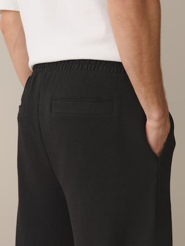 Tapered Pantaloni di Next in nero