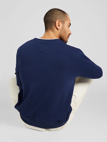 ALPHA INDUSTRIES Sweatshirt in Blauw