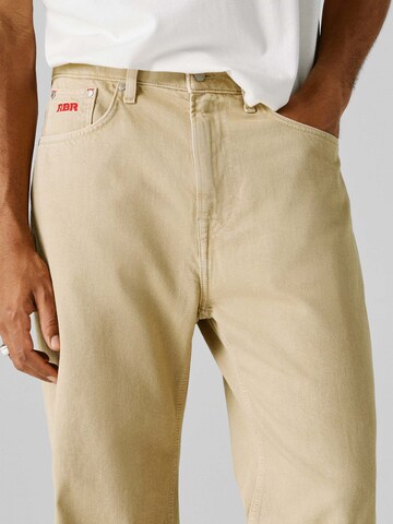 Loosefit Jeans di Red Bull Racing x Pepe Jeans in beige