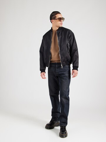 Carhartt WIPSweater majica 'Greatest Flicks' - smeđa boja