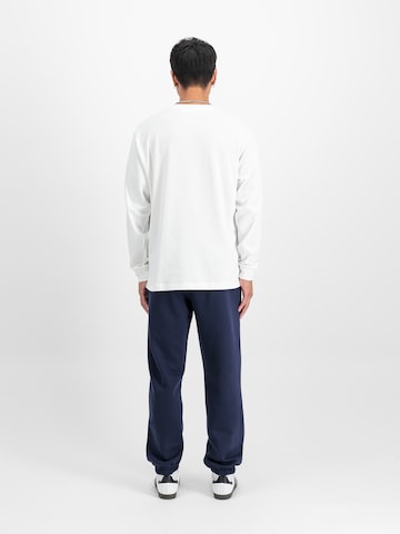 ALPHA INDUSTRIES Tapered Pants in Blue