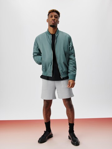 ABOUT YOU x Kingsley Coman Between-season jacket 'Colin' in Green