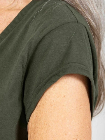 Coster Copenhagen Top ' CC ' w kolorze zielony