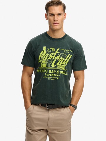 Superdry & Co Koszulka 'LOCAL BUSINESS' w kolorze zielony: przód