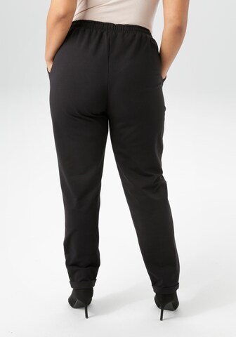 Aniston Regular Hose in Schwarz