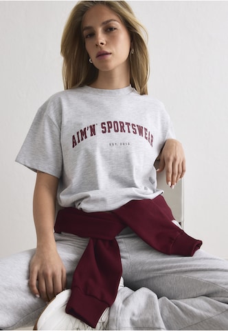 Aim'n Funkční tričko 'Varsity' – šedá