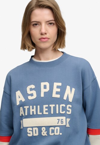 Sweat-shirt 'Aspen Athletics Preppy Ski' Superdry & Co en bleu