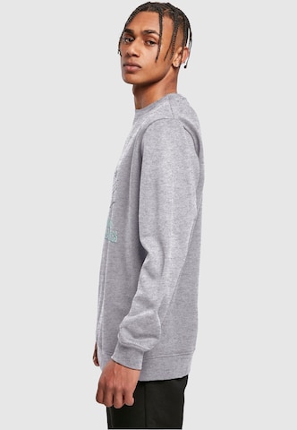 Merchcode Sweatshirt 'Peanuts Chasing Snowflakes' in Grey