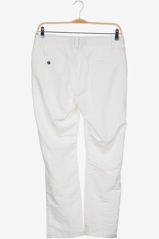 UNDER ARMOUR Pants in 34 in White