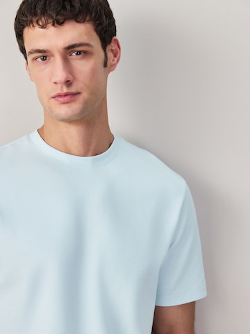 Tricou de la Next pe albastru