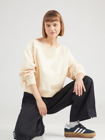 ADIDAS ORIGINALS - Sudadera 'ESS' en beige: frente