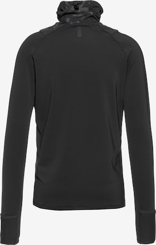 UNDER ARMOUR Performance Shirt 'Outrun' in Black