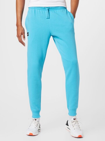 Effilé Pantalon de sport 'Rival' UNDER ARMOUR en bleu : devant