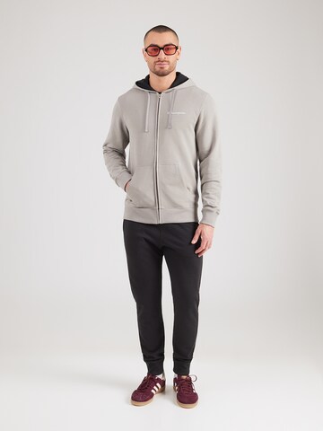 Champion Authentic Athletic Apparel Φόρμα τρεξίματος σε γκρι: μπροστά