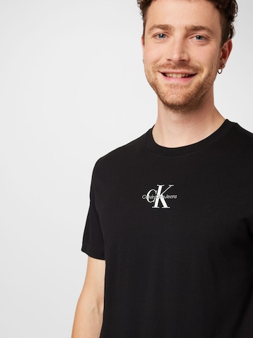 Calvin Klein Jeans T-Shirt in Schwarz | ABOUT YOU