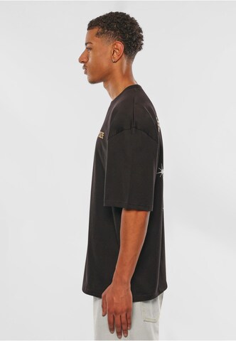 Dropsize T-Shirt 'Rise Above' in Schwarz