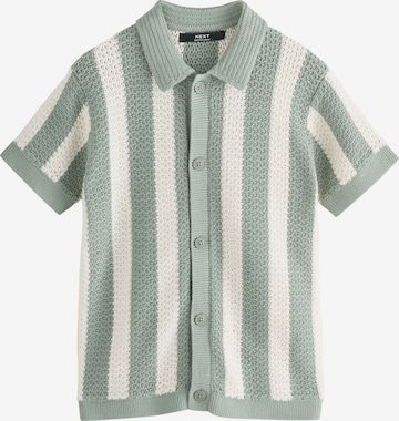 Next Плетена жилетка в зелено: отпред