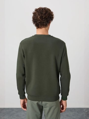 Sweat-shirt Tommy Life en vert