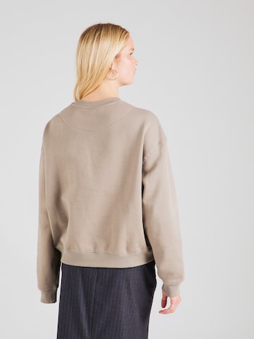 Sweat-shirt 'Essence Standard' WEEKDAY en beige