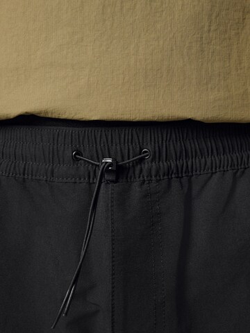 Next - Tapered Pantalón cargo en negro