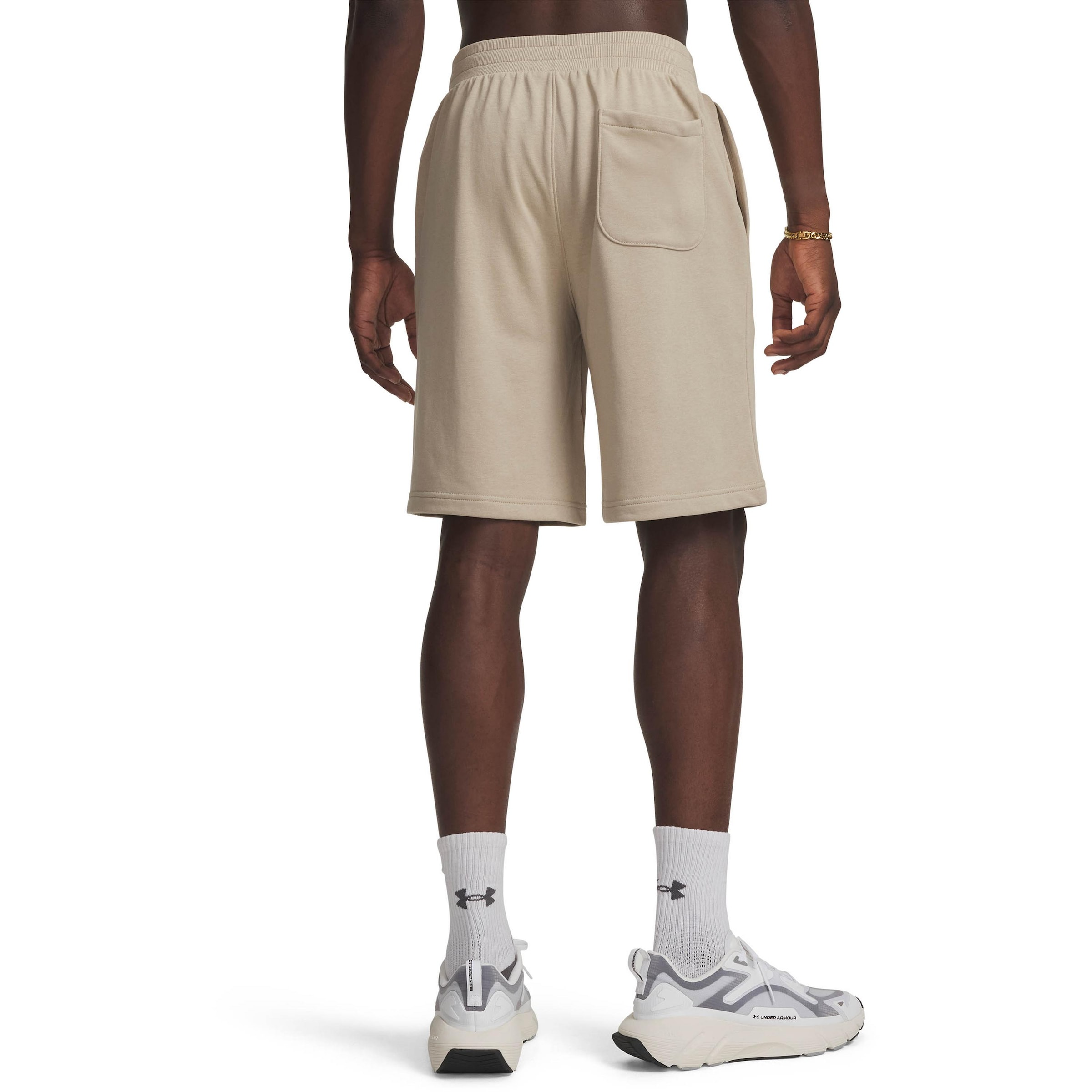 UNDER ARMOUR Loose fit Sports trousers 'Rival' in Brown