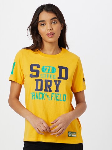 T-shirt 'Collegiate Athletic Union' Superdry en jaune : devant