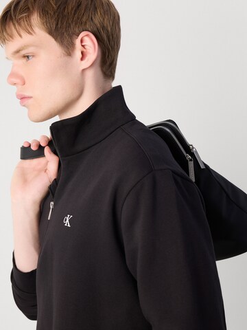 juoda Calvin Klein Megztinis be užsegimo