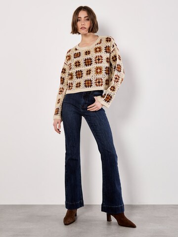 Pull-over ' ' Apricot en gris