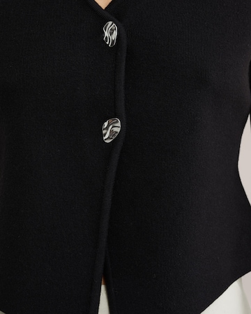 Cardigan 'THE STATEMENT GILET' WE Fashion en noir