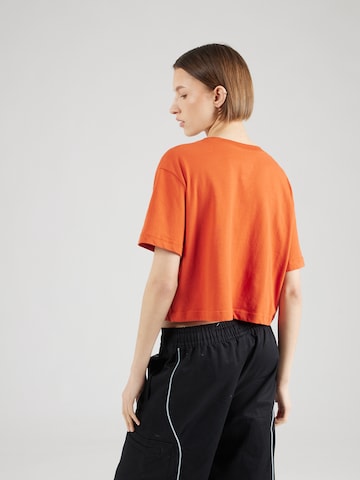 NIKE Functioneel shirt 'HERITAGE' in Oranje