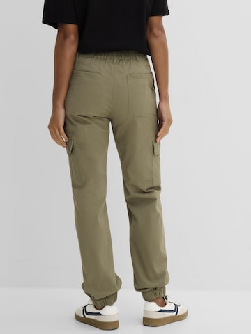 bonprix Tapered Hose in Grün