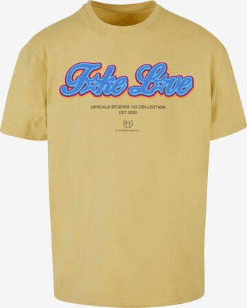 T-Shirt 'F*ke L*ve' MT Upscale en jaune : devant