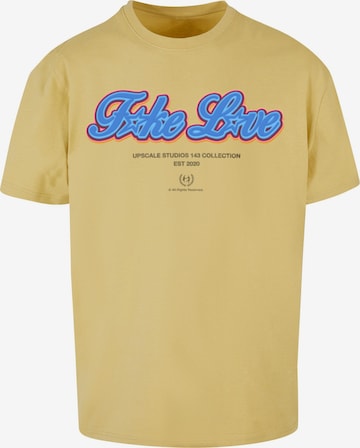 T-Shirt 'F*ke L*ve' MT Upscale en jaune : devant
