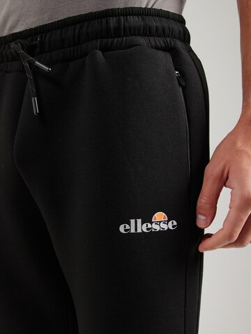ELLESSE - Tapered Pantalón 'Latoso' en negro