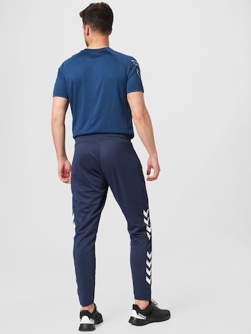 Hummel Zúžený strih Športové nohavice 'Legacy' - Modrá