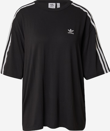 ADIDAS ORIGINALS - Camisa oversized em preto: frente