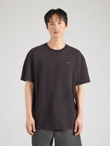 UNDER ARMOUR Performance Shirt in Black: front